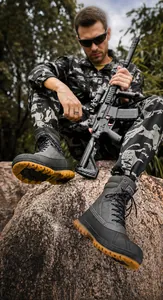Men's high-top outdoor tactical boots featuring durable anti-slip rubber soles for hiking