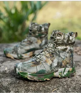 Detail of durable jungle camouflage tactical boots with heavy-duty rubber grip soles