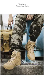 Macro side view of khaki tactical hiking boots with rugged soles and durable lacing system