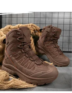 Close-up of brown tactical boots showing side zipper, durable leather, and non-slip sole