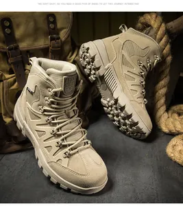 Detail of tan outdoor tactical boots showing suede material and rugged rubber sole