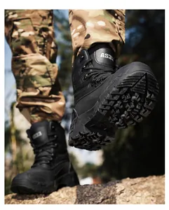 Detail of black tactical boot with AS33 label and anti-slip rubber lug sole