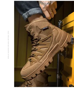 Detail of brown tactical outdoor boot showing suede texture and deep-tread rubber sole