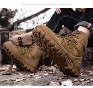 Detail of durable non-slip rubber outsole and khaki suede upper on tactical boots