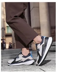 Outdoor walk showing men's sneakers in black, white, and gray with blue details