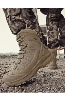 Detailed view of AS33 tan tactical boots featuring reinforced rubber sole and mesh upper