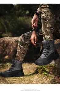 Detail of high-top tactical combat boots with non-slip soles and S33 logo