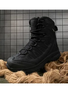 Macro detail of black high-top tactical boots featuring AS33 logo and reinforced soles