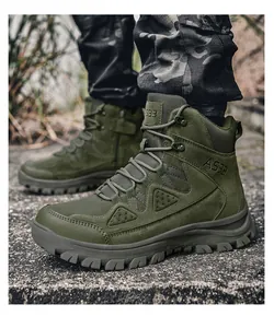 Close-up of olive green tactical boots showing side zipper and A533 model detail