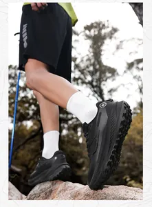 Outdoor men's sneaker detail featuring a thick non-slip outsole and synthetic upper texture