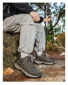Detail of men's non-slip outdoor walking shoe with thick sole and SPORTS logo