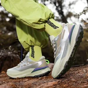 Modern outdoor men's sneakers in beige and light green with chunky cushioned soles