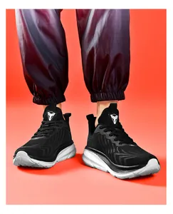 Detailed side view of breathable black mesh running shoes with thick cushioned white soles