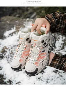 Close-up of warm faux fur lining and lace-up detail on stylish winter snow boots