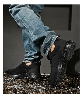 Detail view of black safety sneakers featuring air cushion sole and rotating buckle system