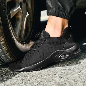 Safety work shoes with steel toe and air cushion sole crushed by car tire test