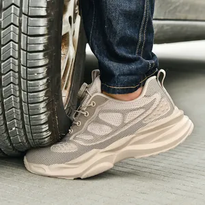 Chaussures de sécurité à coque acier et boucle rotative résistant aux pneus