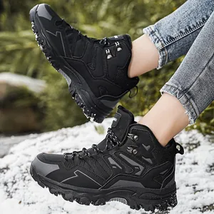 Winter outdoor high-top hiking boots with thick rubber soles and non-slip grip in snow