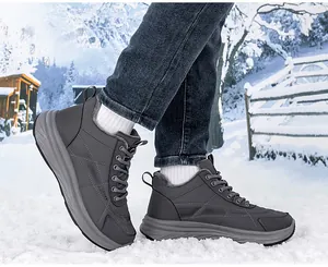 Detailed view of the thickened grey plush lining and durable non-slip sole for winter boots