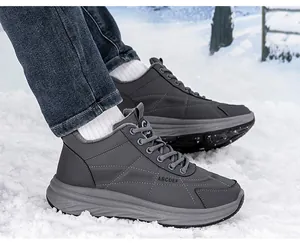 Detail of warm plush lining and non-slip rubber sole on winter outdoor snow boots