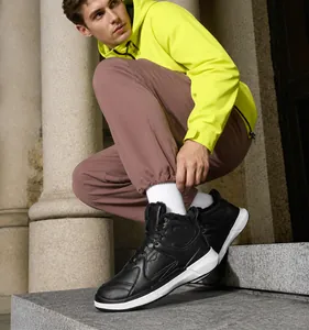 Detail view of men's high-top winter boots showing the warm fleece lining and sturdy sole