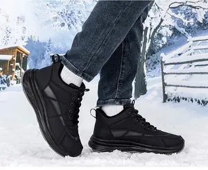 Close-up of winter men's thermal sports shoes with thick soles in a snowy outdoor scene