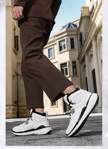 Detail view of high-top outdoor sneakers featuring warm black fleece lining and thick sole