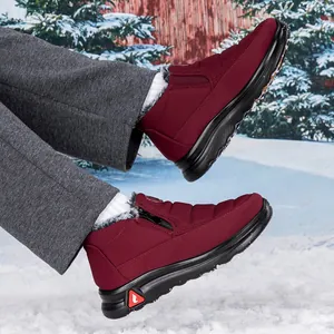 Bottes de neige bordeaux avec doublure en peluche et fermeture éclair sur neige