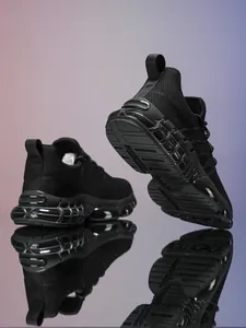Close-up of black breathable mesh sneakers with innovative translucent lattice buffer sole
