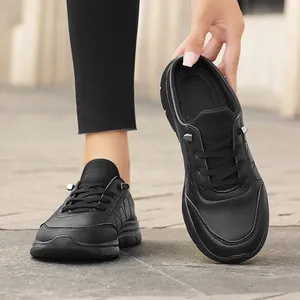 Women's black casual leather mules featuring lace-up design and thick athletic soles