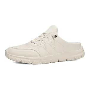 Beige faux leather lace-up mules with thick soles and athletic casual styling