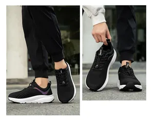 Detailsicht der schwarzen atmungsaktiven Mesh-Laufschuhe mit dicker Sohle für den Außenbereich