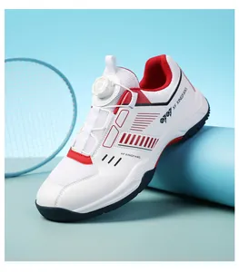 Detail view of indoor court shoes with quick-adjust dial lace system and mesh fabric