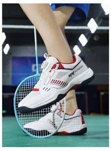 Close-up of professional badminton shoes featuring modern knob lacing system for a secure fit