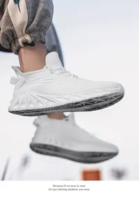 Detail of white mesh running shoes featuring breathable knit fabric and thick wavy soles