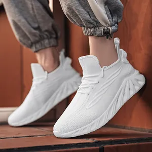 Men's lightweight white mesh running shoes with cushioning wavy soles and breathable fabric