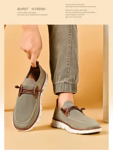 Detailed close-up of khaki breathable mesh fabric and white rubber sole on a casual shoe