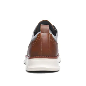 Rear view of men's casual brown leather brogue shoes with grey fabric stitching