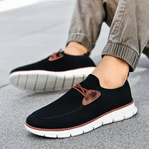 Men's breathable mesh slip-on sneakers in black and white for casual outdoor walking