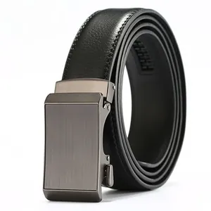 Macro shot of men's business leather belt showing gunmetal buckle and pebble grain texture