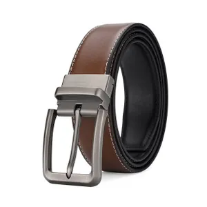 Macro view of men's reversible leather belt showing brown finish and silver pin buckle