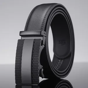 Close-up of a black leather belt with a textured mesh design automatic metal buckle