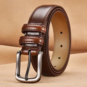 Close-up of dark brown leather belt with matte silver buckle and adjustable round holes