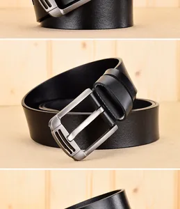 Détail d'une ceinture pour homme en cuir noir avec boucle ardillon en métal brossé