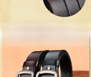 Detailed view of genuine leather belts in black and brown with matte metal buckles