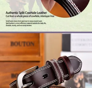 Detail showing cross-section of heavy duty split cowhide leather with silver pin buckle