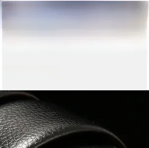 Detailed texture view of black premium PU leather material for men's business belt