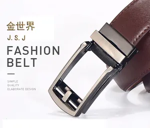 Detail of dark brown Saffiano leather belt with a brushed metal automatic buckle