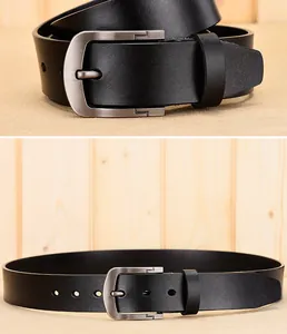 Close-up of men's black leather belt featuring a brushed silver metal D-ring pin buckle