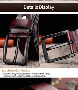 Close-up of matte black alloy buckle with brushed texture on burgundy leather belt